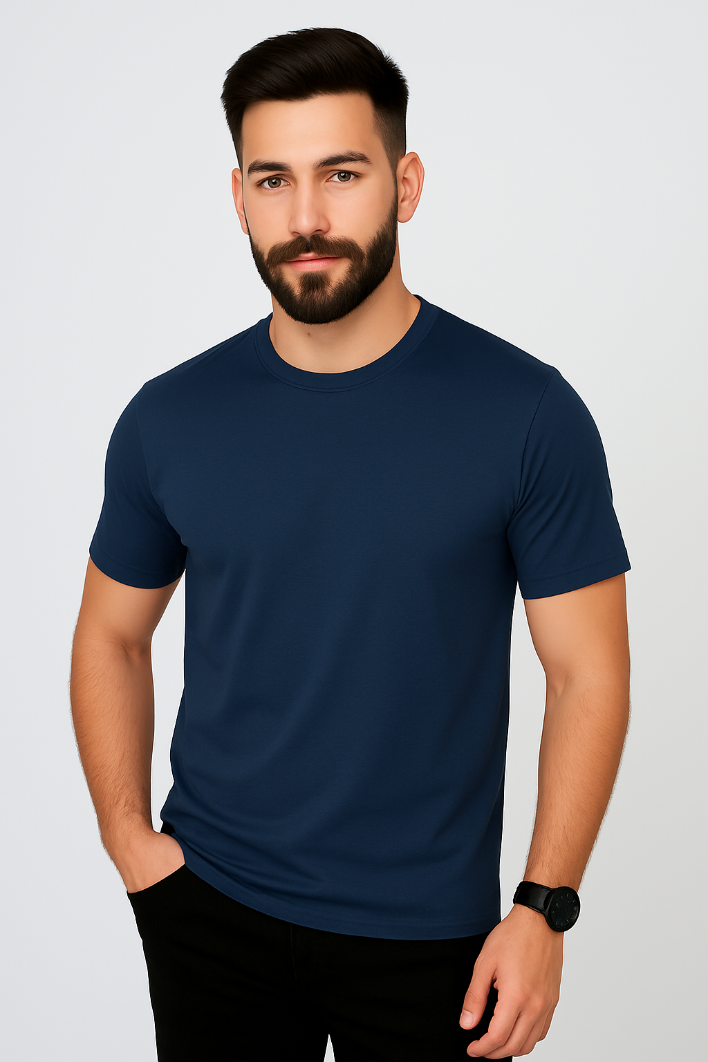 Man wearing a navy blue t-shirt against a light gray background